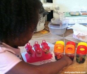 child-helping-make-popsicles